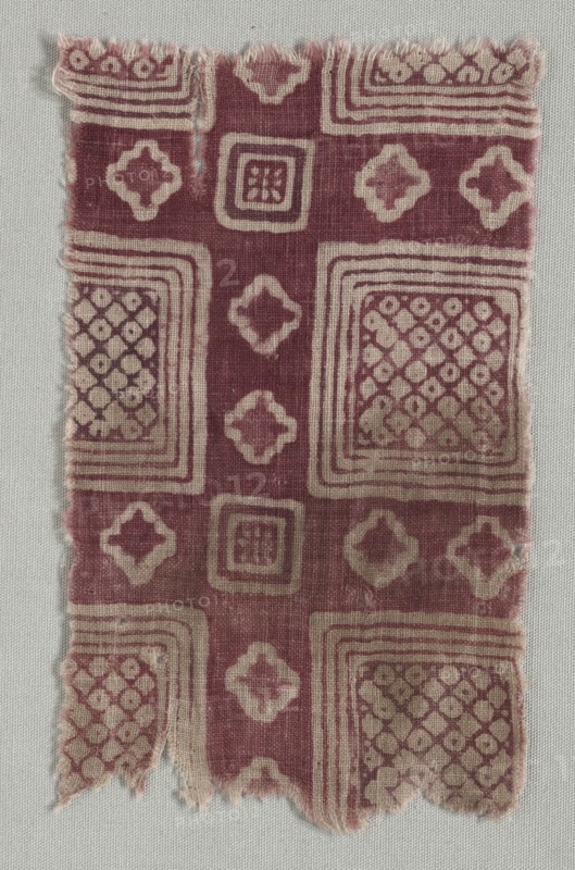 Fragment, 1400s (?). India, 15th century (?). Stamped resist, applied mordant, dyed; cotton; overall: 17.8 x 11.5 cm (7 x 4 1/2 in.)
