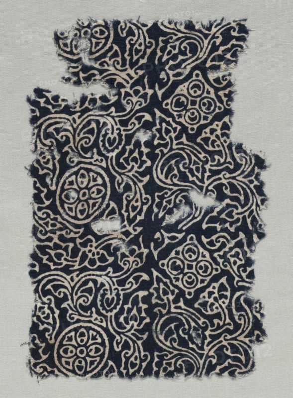 Fragment, 1400s (?). India, 15th century (?). Stamped resist, dyed; cotton; overall: 24.8 x 16.5 cm (9 3/4 x 6 1/2 in.)