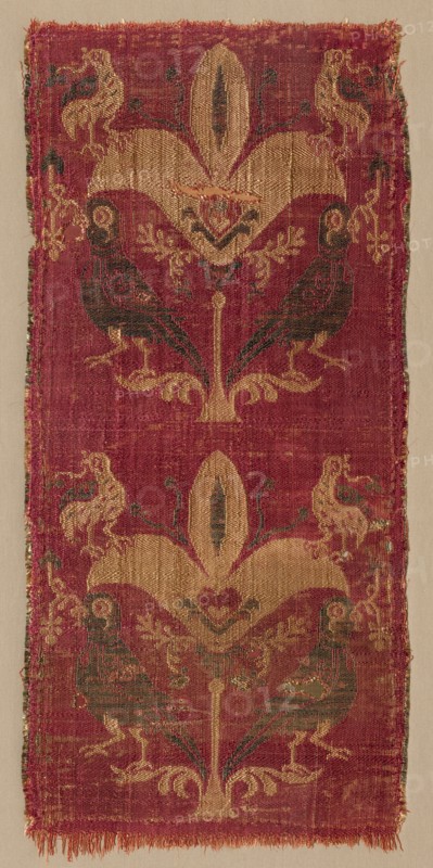 Palmettes and Birds from a Tunic or Curtain, 500s-600s. Egypt or Syria, Byzantine or Islamic periods, 6th-7th Century. Complementary weft-faced plain weave with inner warps (samit); silk; overall: 31.2 x 14 cm (12 5/16 x 5 1/2 in.)