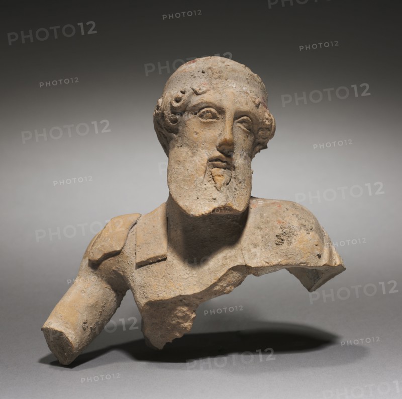Fragment of a Reclining Male Figure, Perhaps a God, 300s BC. South Italy, Greece, 4th Century BC. Terracotta; overall: 14.6 cm (5 3/4 in.).
