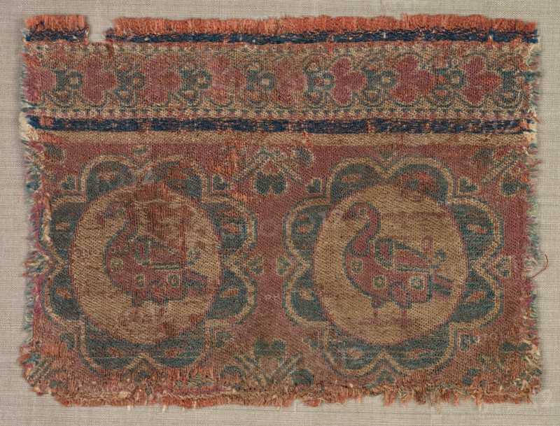 Silk fragment with roundels of ducks, 600s. Iran. Samite: silk; overall: 8.3 x 11.4 cm (3 1/4 x 4 1/2 in.).