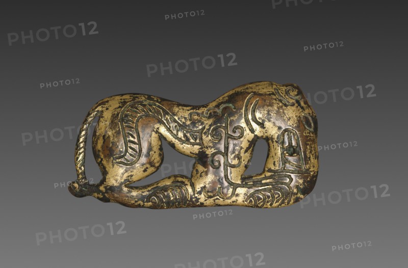 Ornament, Han dynasty (206 BC-AD 220). China, Ordos Region, Han dynasty (202 BC-AD 220). Gilt bronze; overall: 6.1 x 11.8 cm (2 3/8 x 4 5/8 in.).