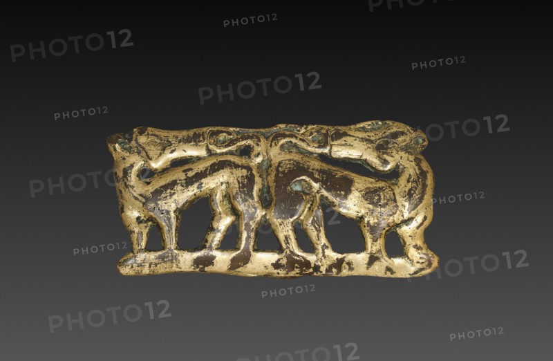 Belt Buckle with Animals, 202 BC-9. China, Ordos region, Western Han dynasty (202 BC-AD 9). Gilt bronze; overall: 6.1 x 11.8 cm (2 3/8 x 4 5/8 in.).