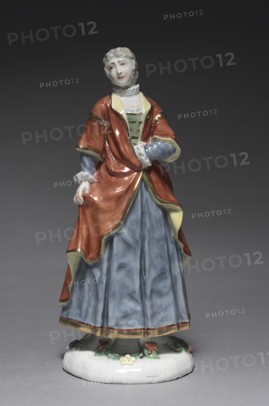 Italian Comedy Figure:  Isabella, c. 1753. Fürstenberg Porcelain Factory (German), Simon Feilner (German, 1798). Porcelain with enamel decoration; overall: 19.2 x 8.3 x 8.1 cm (7 9/16 x 3 1/4 x 3 3/16 in.).