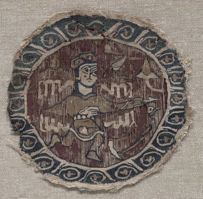 Roundel with figure, 1000s. Egypt, Fatimid period. Plain weave with inwoven tapestry weave: linen and silk; overall: 13.1 x 12.8 cm (5 3/16 x 5 1/16 in.)