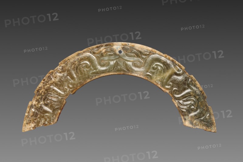 Arc-shaped Pendant with Animal Mask and Interlaced Animal Bands (Huang), 300-100 BC. China, Warring States period (475-221 BC) to Western Han dynasty (202 BC-AD 9). Jade (nephrite); overall: 12.8 cm (5 1/16 in.).