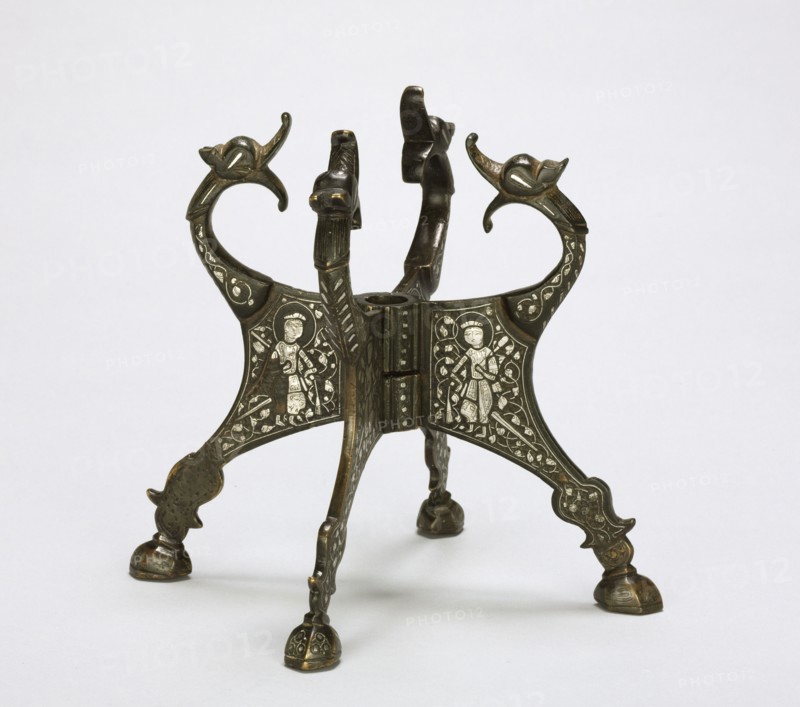 Dragon-headed Stand, 1200s. Northern Iraq or Syria, Zengid or Ayyubid Period, 13th century. Cast brass inlaid with silver; overall: 7.2 x 19.2 cm (2 13/16 x 7 9/16 in.).
