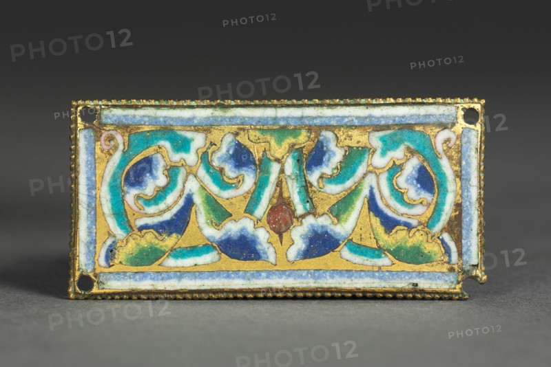 Plaque from a Reliquary Shrine, c. 1180-1190. Germany, Rhine Valley, Cologne, Romanesque period, 12th century. Gilded copper; champlevé and cloisonné enamel; overall: 3.2 x 6.6 cm (1 1/4 x 2 5/8 in.)