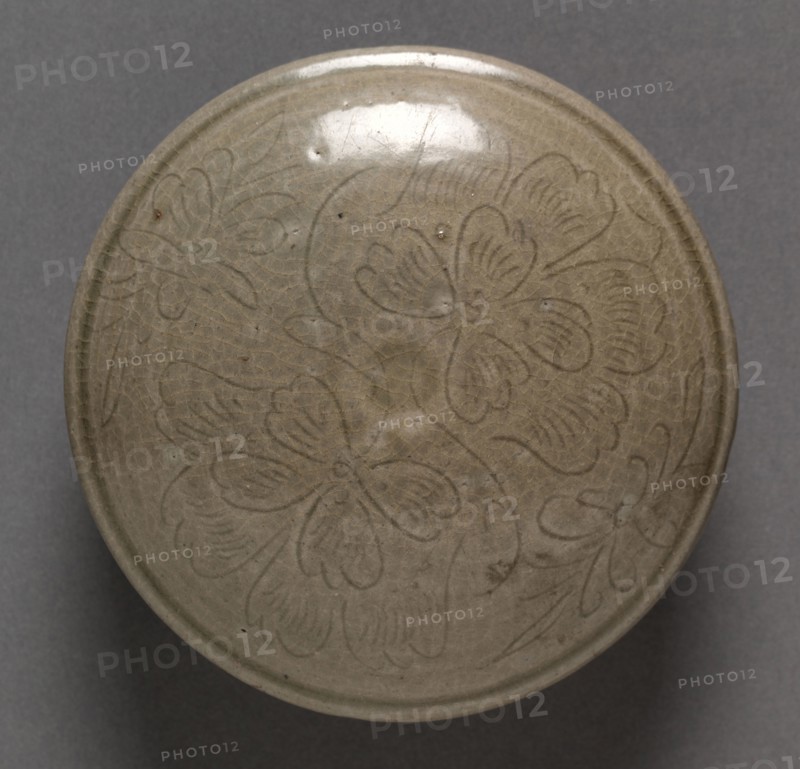Box: Yue ware (lid), 960-1279. China, Zhejiang province, Song dynasty (960-1279). Glazed stoneware with incised decoration; diameter: 12.5 cm (4 15/16 in.); overall: 5.4 cm (2 1/8 in.).
