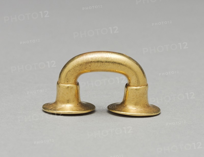 Nose Ornament, c. 400-1000. Colombia, Sinú style, 5th-11th century. Hammered gold; overall: 2.1 x 4 x 1.8 cm (13/16 x 1 9/16 x 11/16 in.).