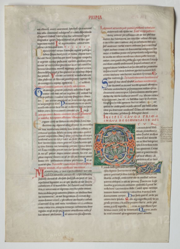 Single Leaf from a Decretum by Gratian: Decorated Initial Q[uidam habens filium obtulit] and Quadruple Arcade with Concordance of Greek and Latin Alphabets , c. 1160-1165. France, Burgundy, Archdiocese of Sens, Abbey of Pontigny, 12th century. Ink and tempera on vellum; sheet: 44.8 x 32 cm (17 5/8 x 12 5/8 in.); framed: 63.5 x 48.3 cm (25 x 19 in.); matted: 55.9 x 40.6 cm (22 x 16 in.).