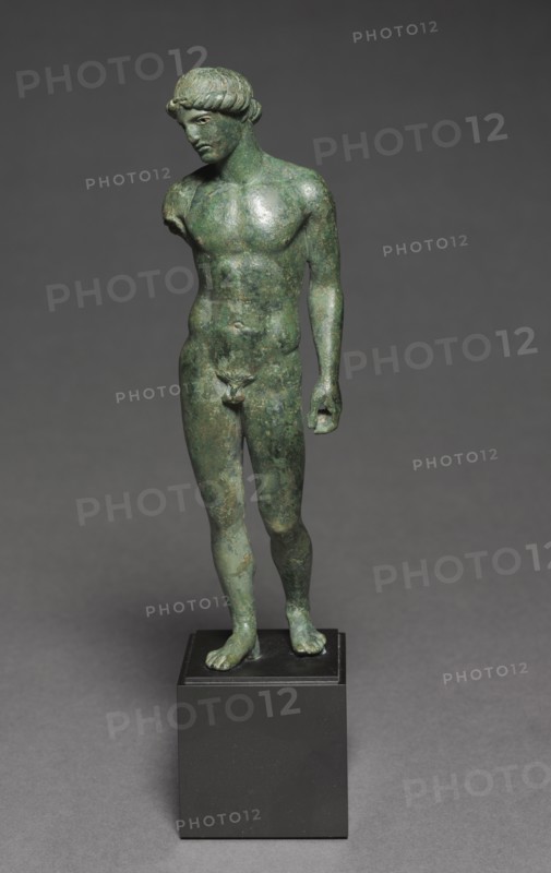 Athlete Making an Offering, c. 450-425 BC. Greece, probably from workshop of Locri or Tarentum, Classical Period. Bronze; overall: 21 cm (8 1/4 in.); without tang: 19.8 cm (7 13/16 in.).