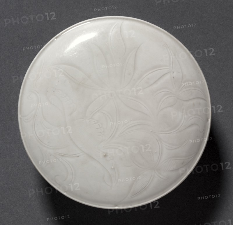 Covered Box (lid), 1100s. China, Hebei province, Quyang, Northern Song dynasty (960-1127) to Jin dynasty (1115-1234). Cream-glazed porcelain with incised decoration, Ding ware;