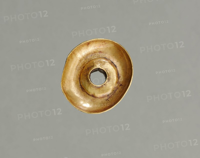 Ear Ornament(?), 500-200 BC. Peru, North Highlands, Chavín de Huantar(?), Chavín style. Hammered and cut gold; diameter: 2.8 cm (1 1/8 in.); overall: 1.6 cm (5/8 in.).