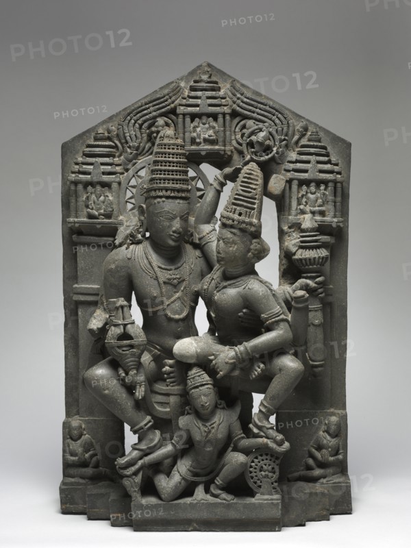 Vishnu and Shri Supported by Garuda, 1000s-1100s. Western India, Karnataka, 11th-12th century. Volcanic Deccan trap; overall: 84.5 x 55.9 cm (33 1/4 x 22 in.).