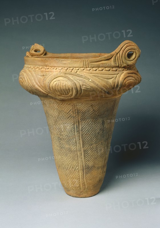 Urn (kame), c. 2000 BC. Japan, Middle Jomon Period (c. 10,500-c. 300 BC). Earthenware, terracotta, impressed and incised; diameter: 33 cm (13 in.); overall: 39.4 cm (15 1/2 in.).