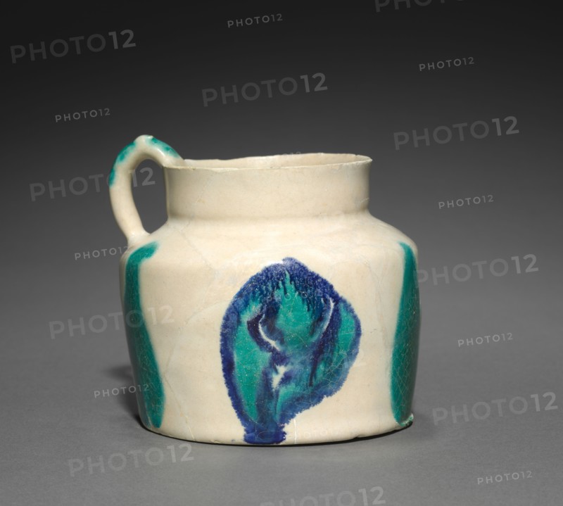 Earthenware Jug painted with Blue and Turquoise, 800s. Iraq, Basra, Abbasid Period, 9th century. Earthenware with overglaze-painted design; diameter of mouth: 6.8 cm (2 11/16 in.); overall: 8.9 cm (3 1/2 in.); diameter of base: 8.9 cm (3 1/2 in.).