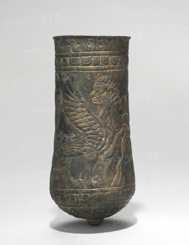 Button-Based Situla, 900-700 BC. Iran, Luristan, 9th-7th Century BC. Bronze, repoussé, punched, incised; diameter: 5.9 cm (2 5/16 in.); overall: 13 cm (5 1/8 in.).