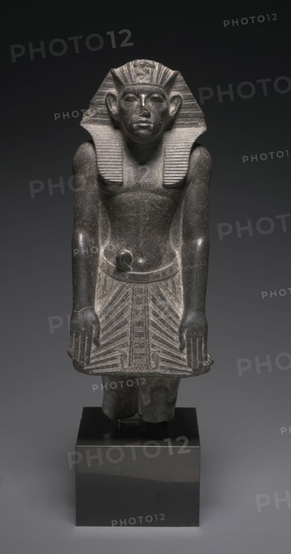 Statue of Amenemhat III, c. 1859-1814 BC. Egypt, Middle Kingdom, Dynasty 12 (1980-1801), reign of Amenemhat III. Granodiorite; overall: 51.2 x 19.8 x 18.4 cm (20 3/16 x 7 13/16 x 7 1/4 in.).