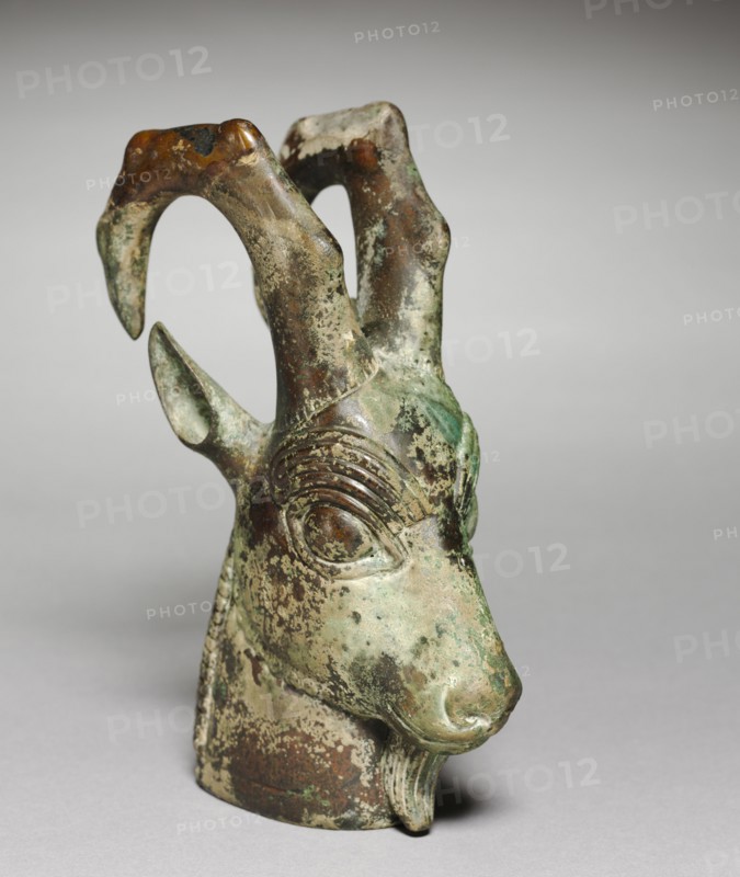 Ibex-Head Ornament, c. 525-450 BC. Iran, Achaemenian, 6th-5th Century BC. Bronze; overall: 16.9 x 6.5 x 11.7 cm (6 5/8 x 2 9/16 x 4 5/8 in.).