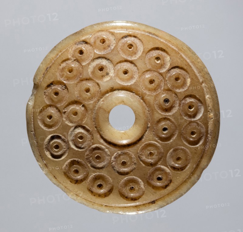 Spindle Whorl, 700s - 900s. Iran, early Islamic period, 8th - 10th century. Bone, incised; overall: 0.3 x 2 x 2 cm (1/8 x 13/16 x 13/16 in.)