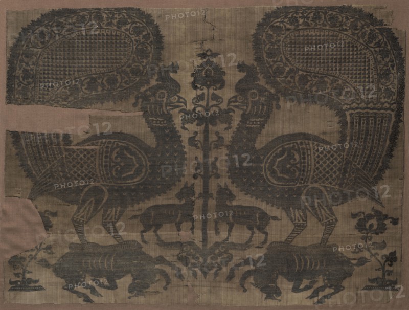 Fragment, 1003. Iran or Iraq, Buyid period, early 11th century. Lampas weave, silk; overall: 71.1 x 95 cm (28 x 37 3/8 in.)