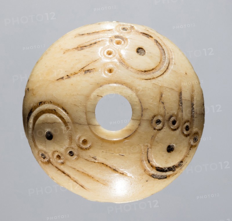Spindle Whorl, 700s - 900s. Iran, early Islamic period, 8th - 10th century. Bone, incised; overall: 0.7 x 2.1 x 2.1 cm (1/4 x 13/16 x 13/16 in.)