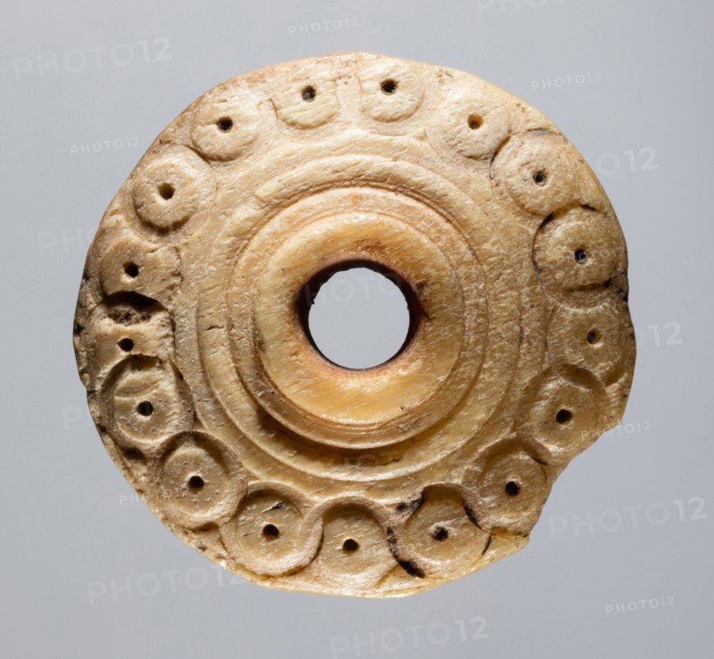 Spindle Whorl, 700s - 900s. Iran, early Islamic period, 8th - 10th century. Bone, incised; overall: 0.5 x 2.2 x 2.2 cm (3/16 x 7/8 x 7/8 in.)
