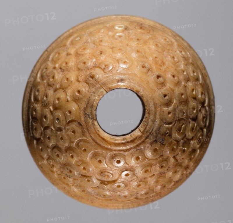 Spindle Whorl, 700s - 900s. Iran, early Islamic period, 8th - 10th century. Bone, incised; overall: 1 x 1.9 x 1.9 cm (3/8 x 3/4 x 3/4 in.)
