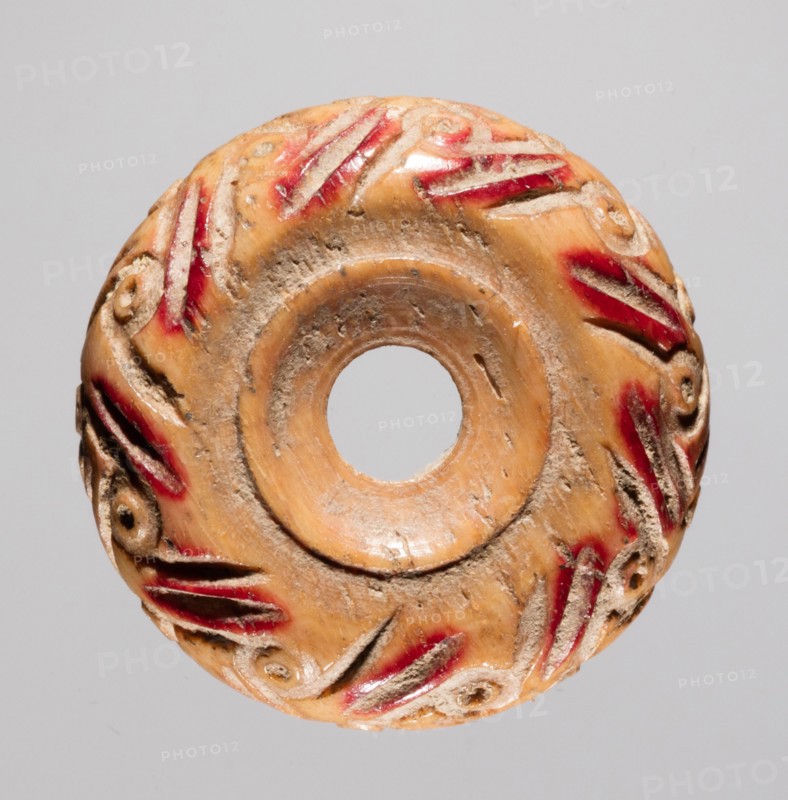 Spindle Whorl, 700s - 900s. Iran, early Islamic period, 8th - 10th century. Bone, incised; overall: 0.7 x 1.7 x 1.7 cm (1/4 x 11/16 x 11/16 in.)