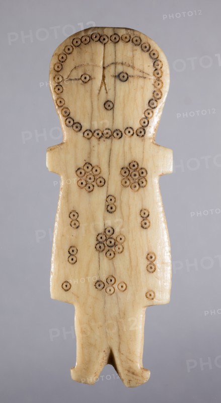 Figurine, 700s - 900s. Iran, early Islamic period, 8th - 10th century. Bone, incised; overall: 8.9 x 3.1 x 0.5 cm (3 1/2 x 1 1/4 x 3/16 in.)