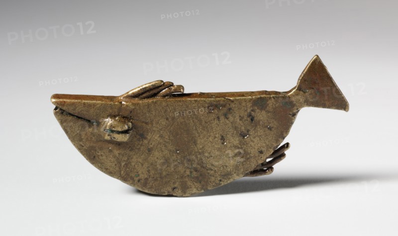 Gold Weight: Fish, 1800s. Africa, Ghana, Asante, 19th century. Brass, bronze; overall: 2.8 x 6.6 x 0.4 cm (1 1/8 x 2 5/8 x 3/16 in.)