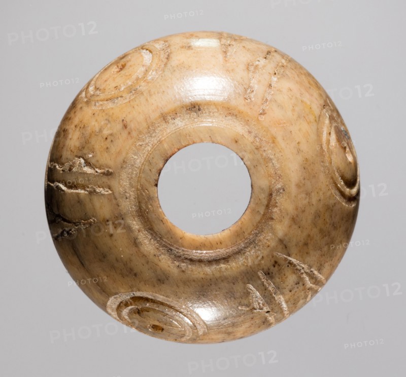 Spindle Whorl, 700s - 900s. Iran, early Islamic period, 8th - 10th century. Bone, incised; overall: 1.1 x 2 x 2 cm (7/16 x 13/16 x 13/16 in.)