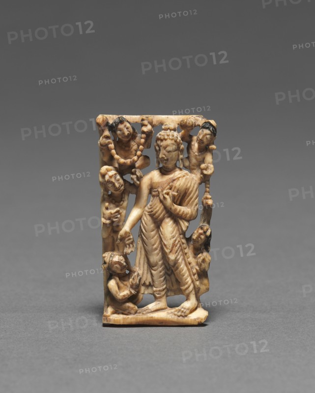 Walking Buddha, 8th Century. India, Kashmir, 8th century. Ivory; overall: 4.8 x 2.8 x 0.6 cm (1 7/8 x 1 1/8 x 1/4 in.).