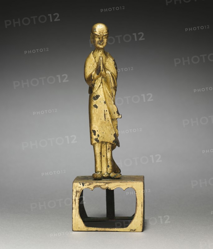 Adoring Monk, early 500s. China, Northern Wei dynasty (386-534). Gilt bronze; overall: 14.9 cm (5 7/8 in.); base: 3.6 x 5.2 x 3.9 cm (1 7/16 x 2 1/16 x 1 9/16 in.); figure: 11.5 cm (4 1/2 in.).