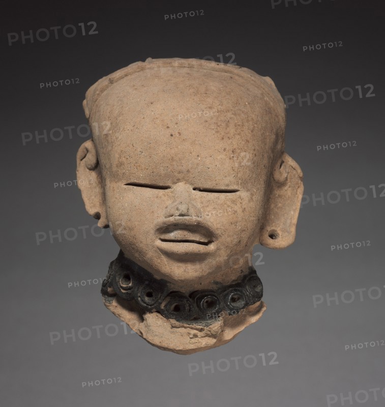 Smiling Head, 600-1100. Mexico, Classic Veracruz (Totonac or Tajin). Terracotta; overall: 17.2 x 13.1 x 10.6 cm (6 3/4 x 5 3/16 x 4 3/16 in.).