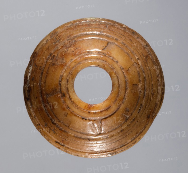 Spindle Whorl, 700s - 900s. Iran, early Islamic period, 8th - 10th century. Bone, incised; overall: 0.6 x 1.8 x 1.8 cm (1/4 x 11/16 x 11/16 in.)