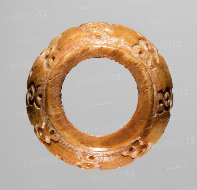 Spindle Whorl, 700s - 900s. Iran, early Islamic period, 8th - 10th century. Bone, incised; overall: 0.7 x 1.4 x 1.4 cm (1/4 x 9/16 x 9/16 in.)