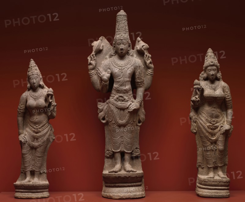 Vishnu with Shri, and Bhu, 900-950. South India, Tamil Nadu, probably Pudokkatai, early Chola Dynasty, 10th Century. Granite;
