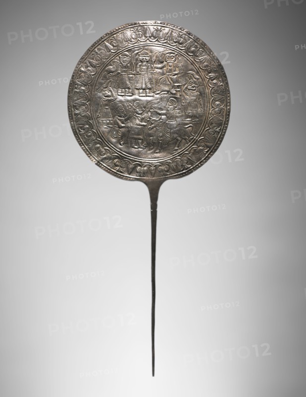 Votive Pin with Decorated Disc, 800-600 BC. Iran, Luristan, 9th-7th Century BC. Silver, repoussé and incised; overall: 35.1 x 15.9 x 1.7 cm (13 13/16 x 6 1/4 x 11/16 in.).