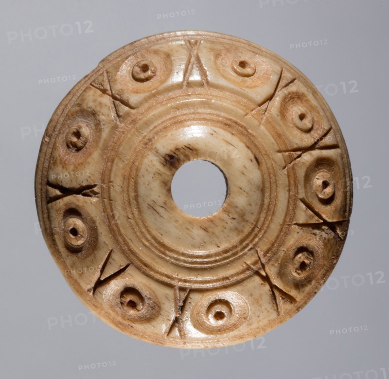 Spindle Whorl, 700s - 900s. Iran, early Islamic period, 8th - 10th century. Bone, incised; overall: 0.7 x 2.1 x 2.1 cm (1/4 x 13/16 x 13/16 in.)