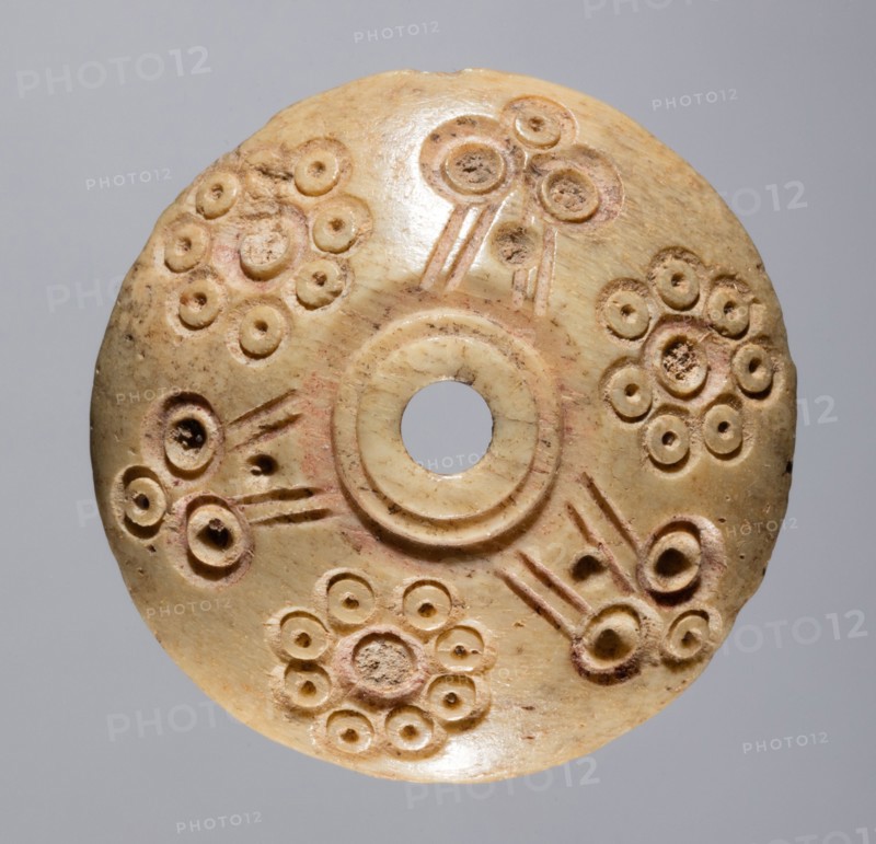 Spindle Whorl, 700s - 900s. Iran, early Islamic period, 8th - 10th century. Bone, incised; overall: 0.6 x 2.4 x 2.4 cm (1/4 x 15/16 x 15/16 in.)