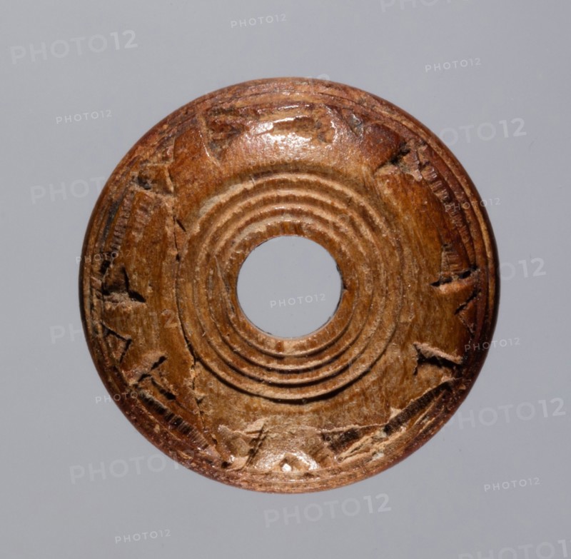 Spindle Whorl, 700s - 900s. Iran, early Islamic period, 8th - 10th century. Bone, incised; overall: 0.6 x 1.5 x 1.5 cm (1/4 x 9/16 x 9/16 in.)