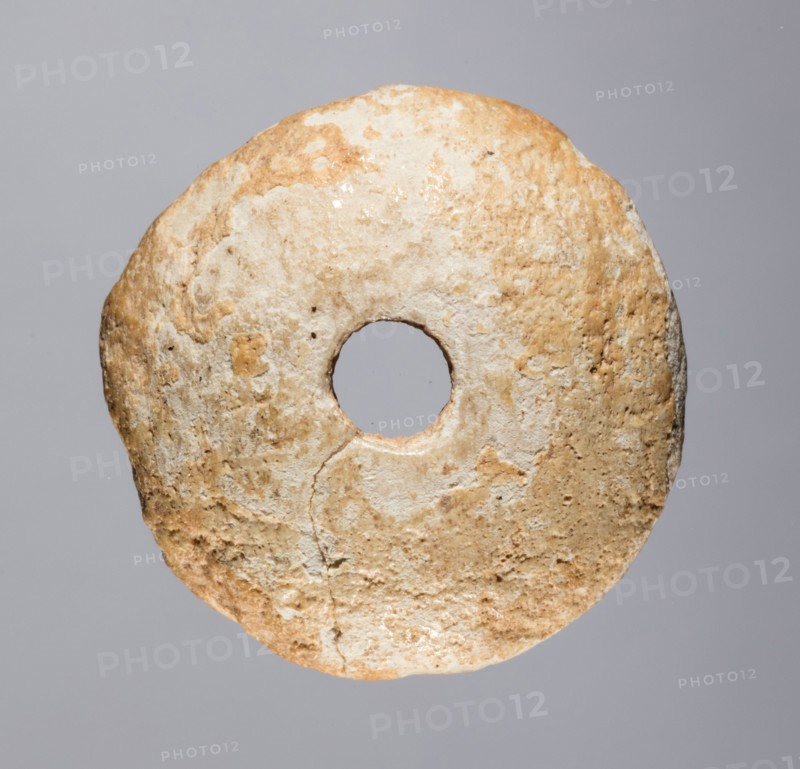 Spindle Whorl, 700s - 900s. Iran, early Islamic period, 8th - 10th century. Bone, incised; overall: 0.6 x 2.4 x 2.4 cm (1/4 x 15/16 x 15/16 in.)