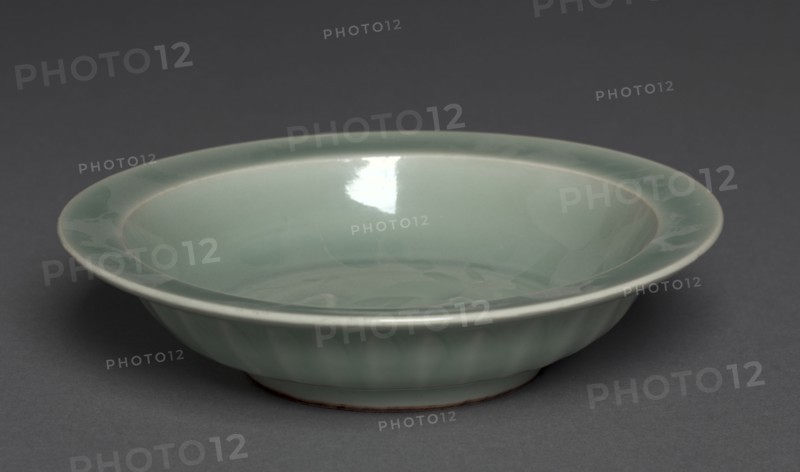 Dish with Two Fish in Relief:  Longquan Ware, mid-1200s. China, Zhejiang province, Southern Song dynasty (1127-1279). Glazed porcelain with molded decoration; diameter: 21.3 cm (8 3/8 in.); overall: 5.1 cm (2 in.).