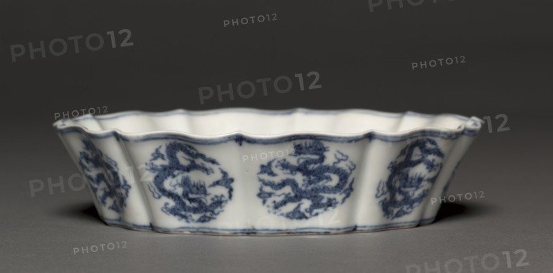 Brush Washer with Dragons, 1426-1435. China, Jiangxi province, Jingdezhen, Ming dynasty (1368-1644), Xuande reign (1426-1435). Porcelain with underglaze blue decoration; diameter: 18 cm (7 1/16 in.); overall: 4.5 cm (1 3/4 in.).