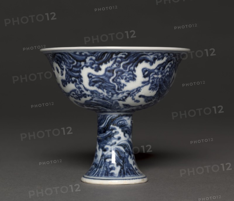 Stem Cup, 1426-1435. China, Jiangxi province, Jingdezhen, Ming dynasty (1368-1644), Xuande mark and period (1426-1435). Porcelain with reversed underglaze blue and incised decoration; diameter: 10.1 cm (4 in.); overall: 9 cm (3 9/16 in.).