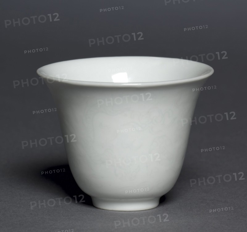 Cup with Dragon and Clouds, 1522-1566. China, Jiangxi province, Jingdezhen kilns, Ming dynasty (1368-1644), Jiajing mark and reign (1521-1566). Porcelain with incised decoration and white glaze; diameter: 7.2 cm (2 13/16 in.); overall: 5.8 cm (2 5/16 in.).