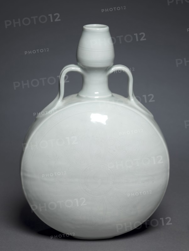 Gourd Flask with Floral Medallion, 1403-1424. China, Jiangxi province, Jingdezhen, Ming dynasty (1368-1644), Yongle period (1403-1424). Porcelain with incised decoration and whit glaze; overall: 28.1 x 20.4 cm (11 1/16 x 8 1/16 in.).