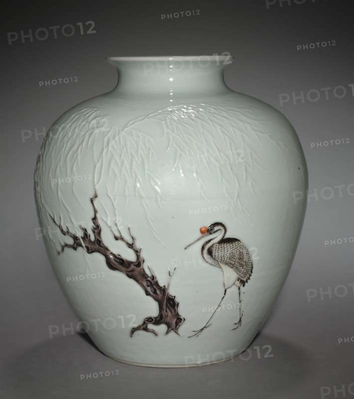 Jar with Crane and Willow in Relief, 18th Century. China, Jiangxi province, Jingdezhen kilns, Qing dynasty (1644-1911). Porcelain with raised and overglaze enamel; diameter: 20.5 cm (8 1/16 in.); overall: 22.3 cm (8 3/4 in.).